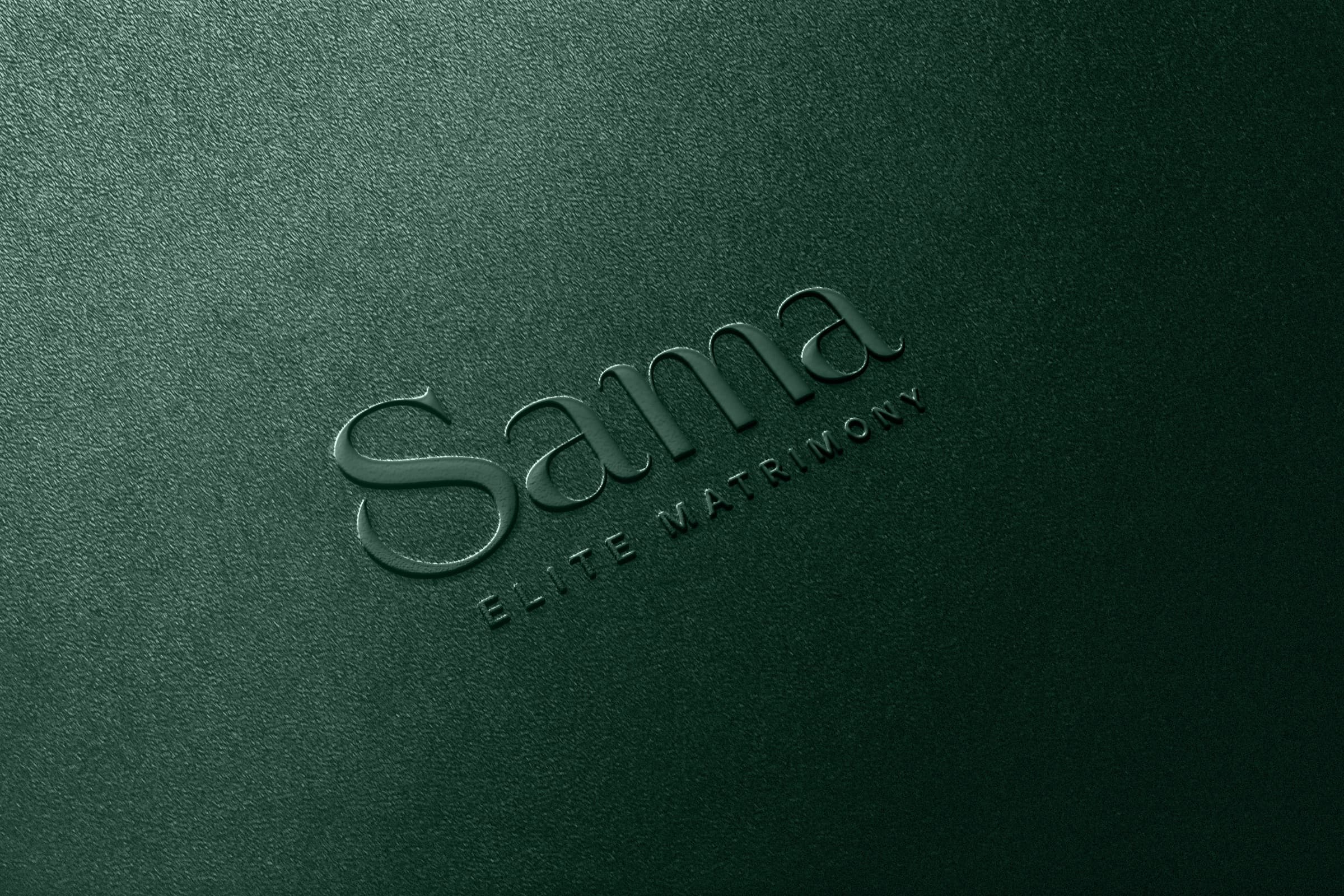 Sama logo embossed on green leather